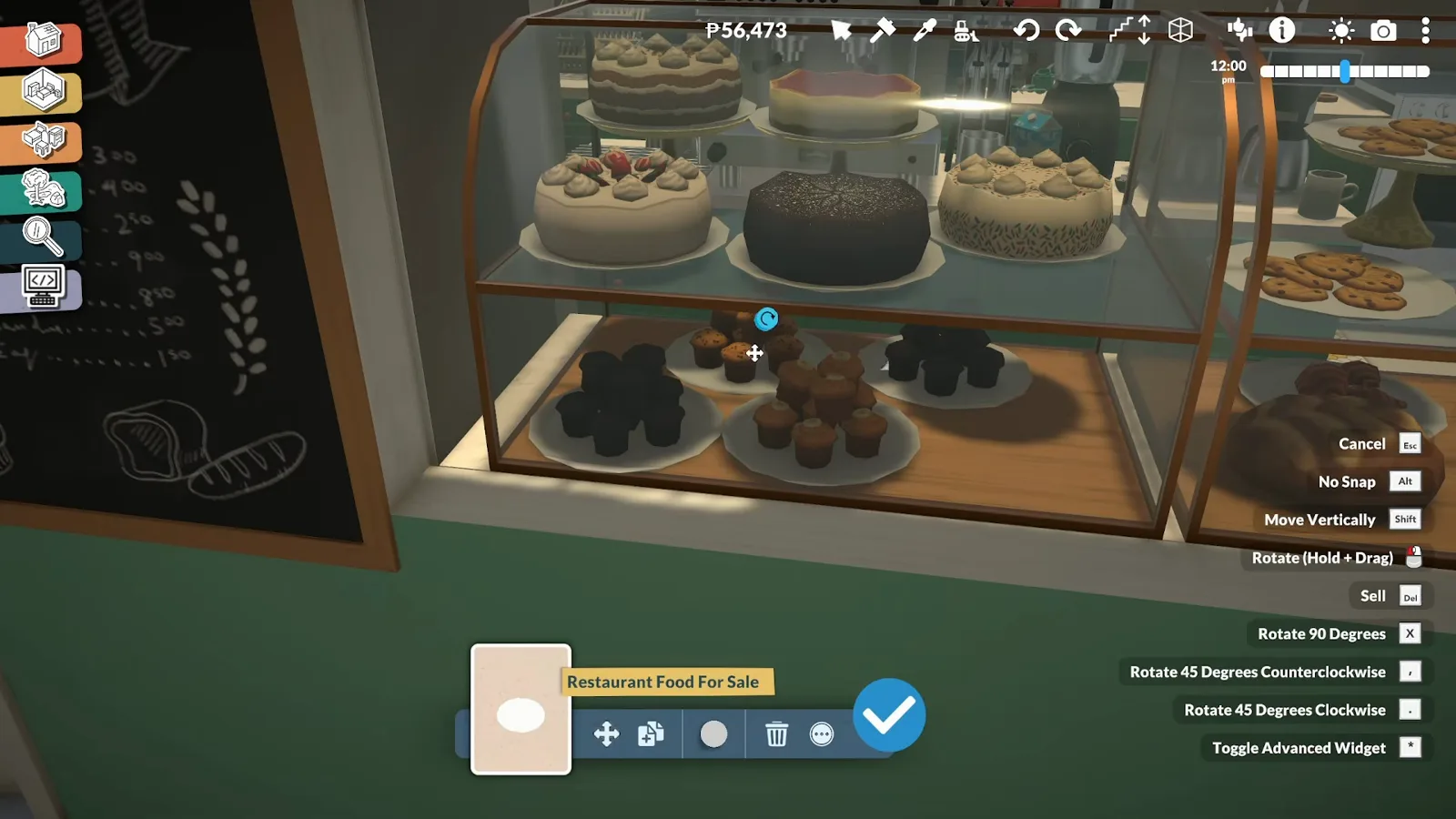 Paralives glass bakery display case stocked with cream cakes, a chocolate cake and cupcakes beside a price-list chalkboard, a Restaurant Food For Sale plate selected Paralives glass bakery display case stocked with cream cakes, a chocolate cake and cupcakes beside a price-list chalkboard, a Restaurant Food For Sale plate selected