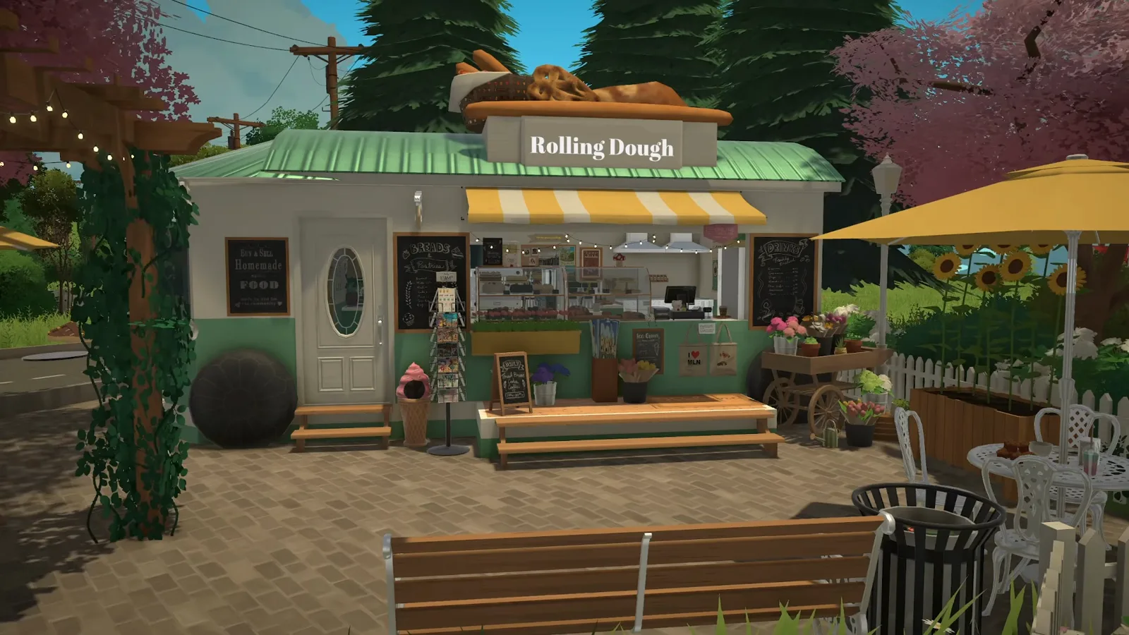 Finished Paralives trailer bakery at golden hour, the Rolling Dough sign crowned with giant bread under a yellow striped awning, chalkboard menus and a white picket-fenced patio Finished Paralives trailer bakery at golden hour, the Rolling Dough sign crowned with giant bread under a yellow striped awning, chalkboard menus and a white picket-fenced patio