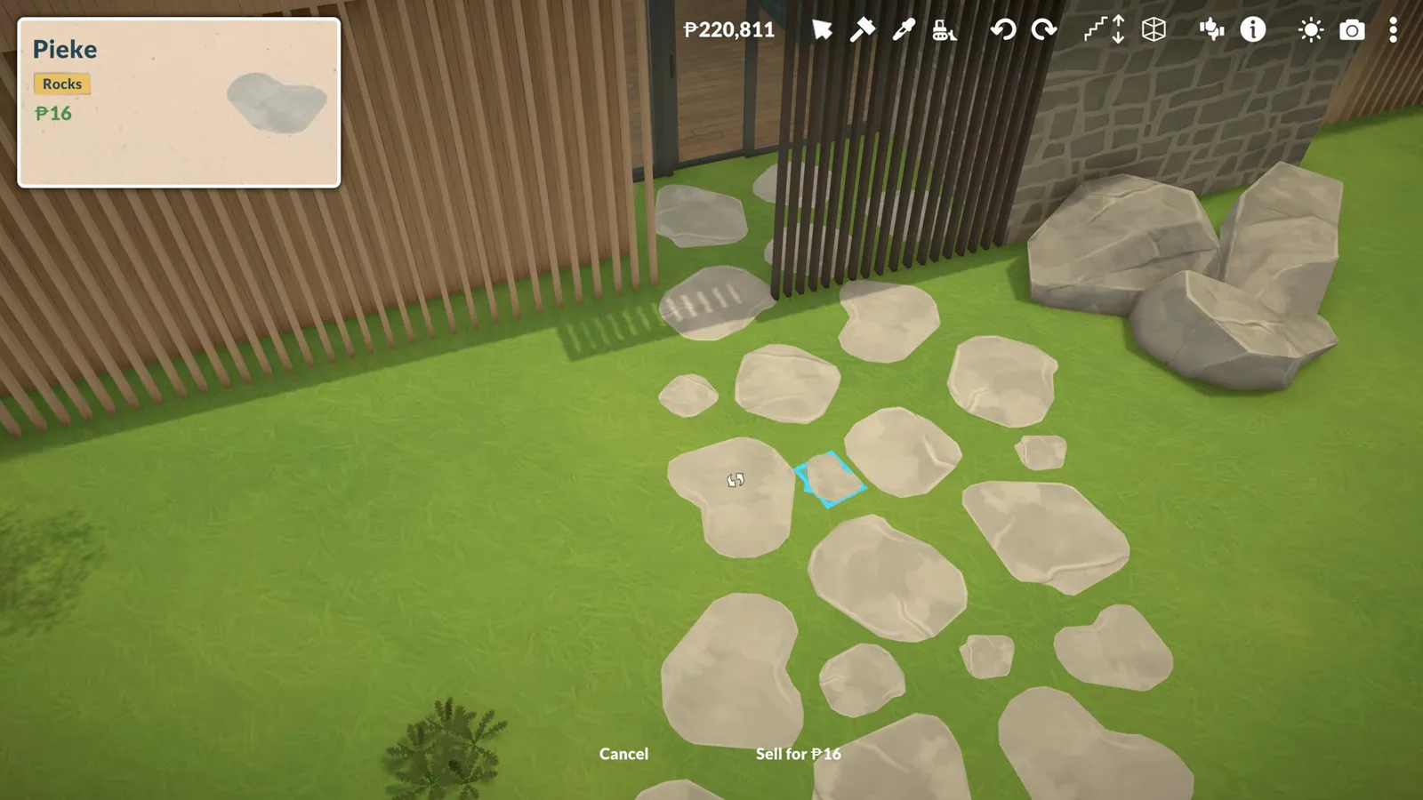 Mixed-size stepping stones curving across the lawn toward the gate of a Paralives beach house lot Mixed-size stepping stones curving across the lawn toward the gate of a Paralives beach house lot