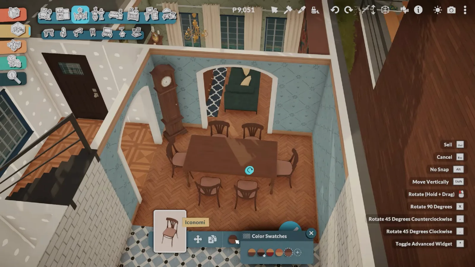 Dining room of a Paralives brownstone with blue walls, a grandfather clock and a wooden table under an archway Dining room of a Paralives brownstone with blue walls, a grandfather clock and a wooden table under an archway