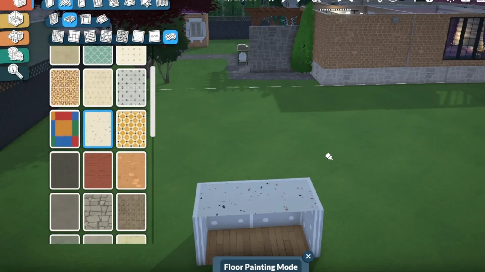 Choosing a speckled stone floor pattern in Paralives to give the half-wall island a granite-style countertop Choosing a speckled stone floor pattern in Paralives to give the half-wall island a granite-style countertop