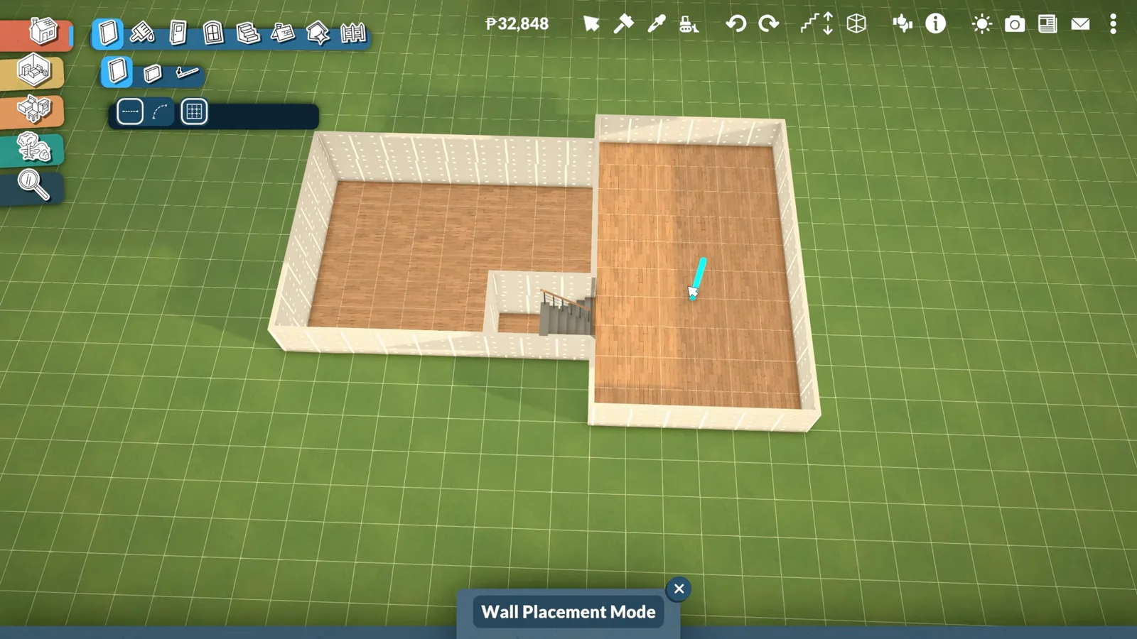 Fence placement mode in Paralives closing the open edge beside a split-level staircase on quarter-tile grid