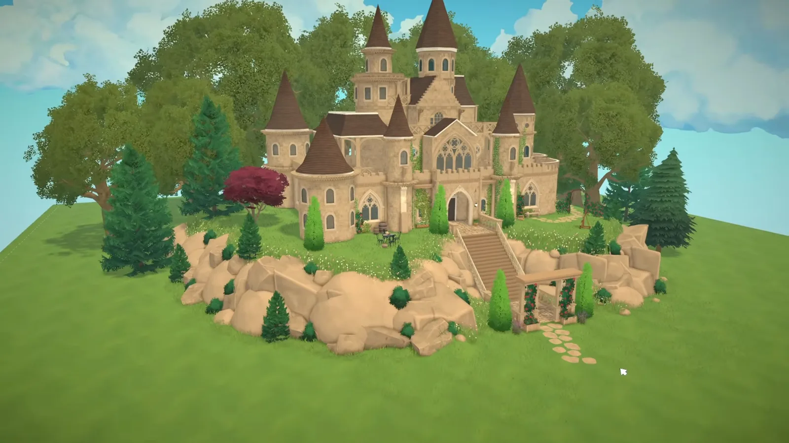 Finished Paralives sandstone castle with conical turret roofs, crenellated walls and a long stone staircase climbing a boulder-ringed outcrop