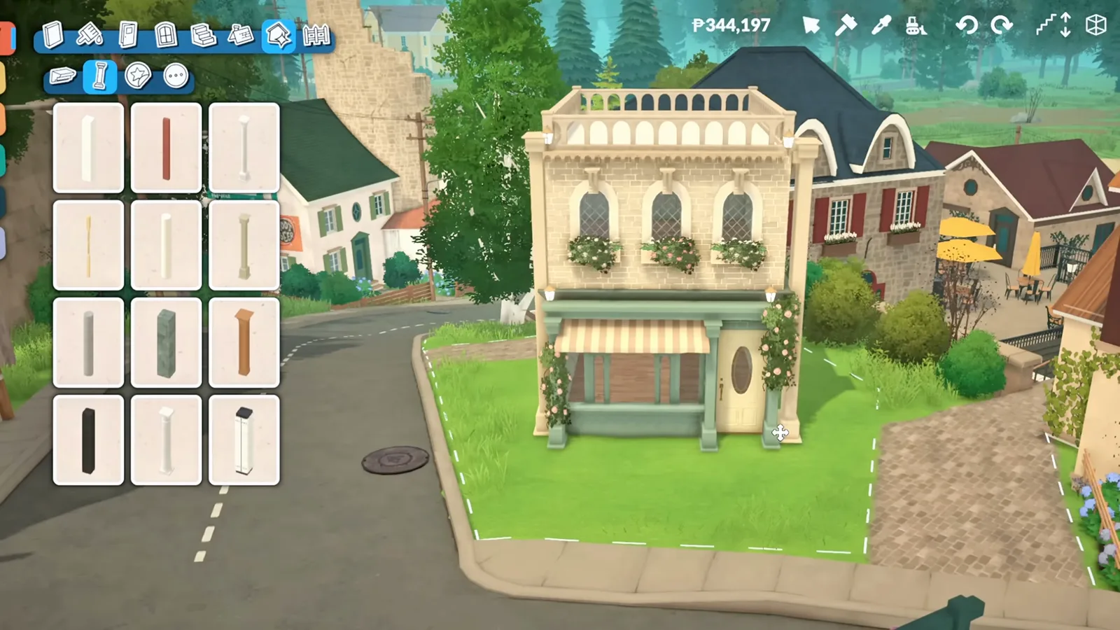 Paralives column catalogue open beside a cream cafe facade with arched windows, flower boxes and a balustrade Paralives column catalogue open beside a cream cafe facade with arched windows, flower boxes and a balustrade