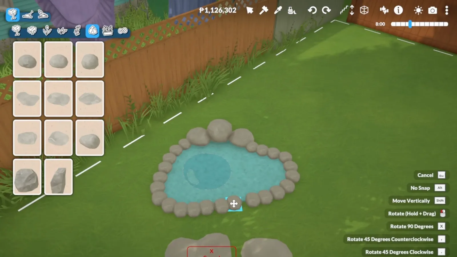 Small duck pond edged with rocks being placed on a Paralives cottage lawn with the rock catalogue open Small duck pond edged with rocks being placed on a Paralives cottage lawn with the rock catalogue open