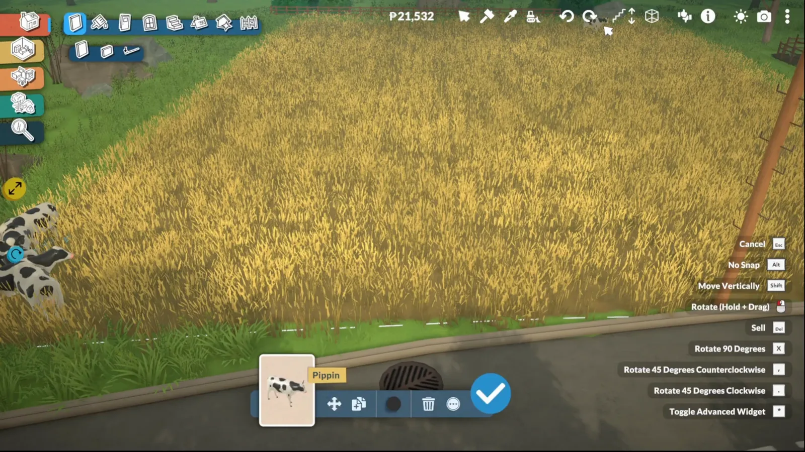 Empty golden wheat field residence lot by a countryside road with a plastic cow statue in Paralives