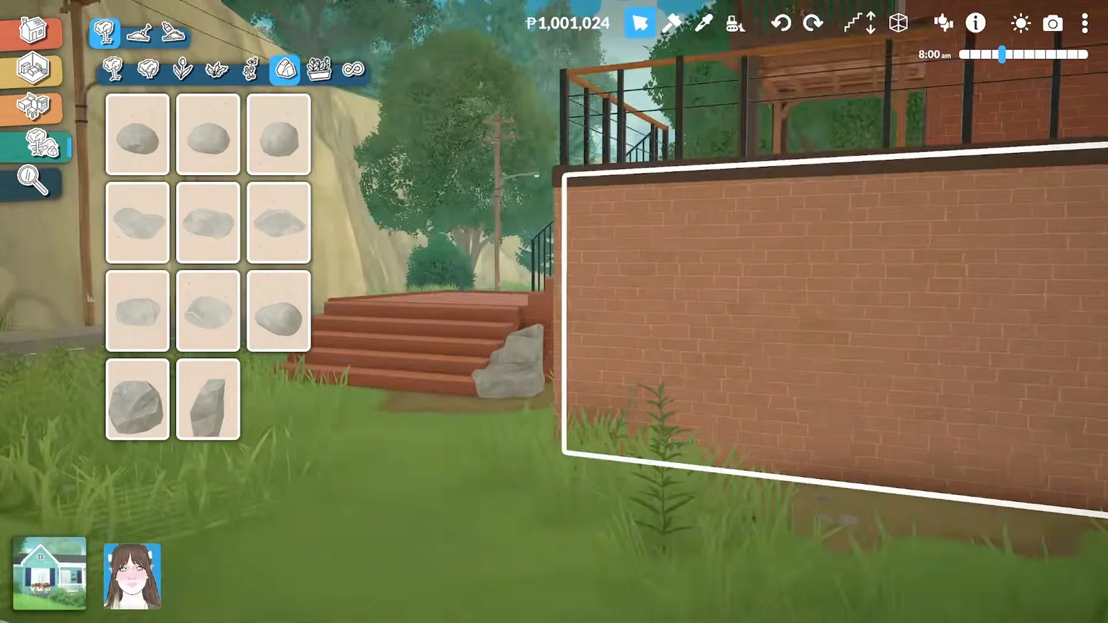Paralives boulder catalogue open beside an exterior staircase where grey rocks pile against a tall brick retaining wall. Paralives boulder catalogue open beside an exterior staircase where grey rocks pile against a tall brick retaining wall.