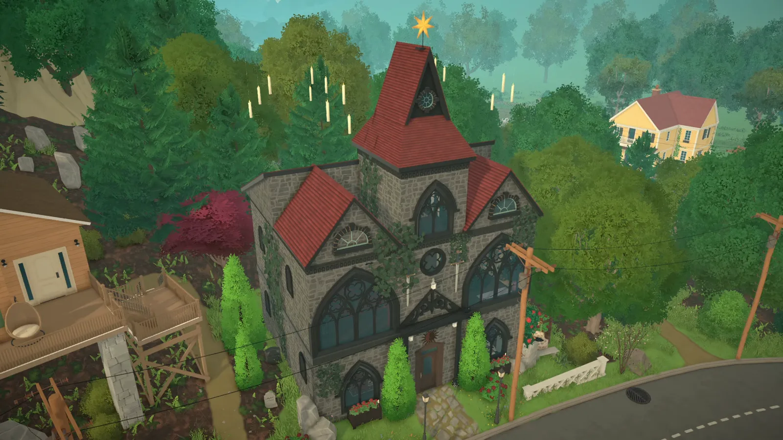 A finished Paralives gothic house converted from a church: gray stone walls, dark red steep roofs, tall pointed-arch windows and a gold star on the spire, seen from the street corner in daylight A finished Paralives gothic house converted from a church: gray stone walls, dark red steep roofs, tall pointed-arch windows and a gold star on the spire, seen from the street corner in daylight