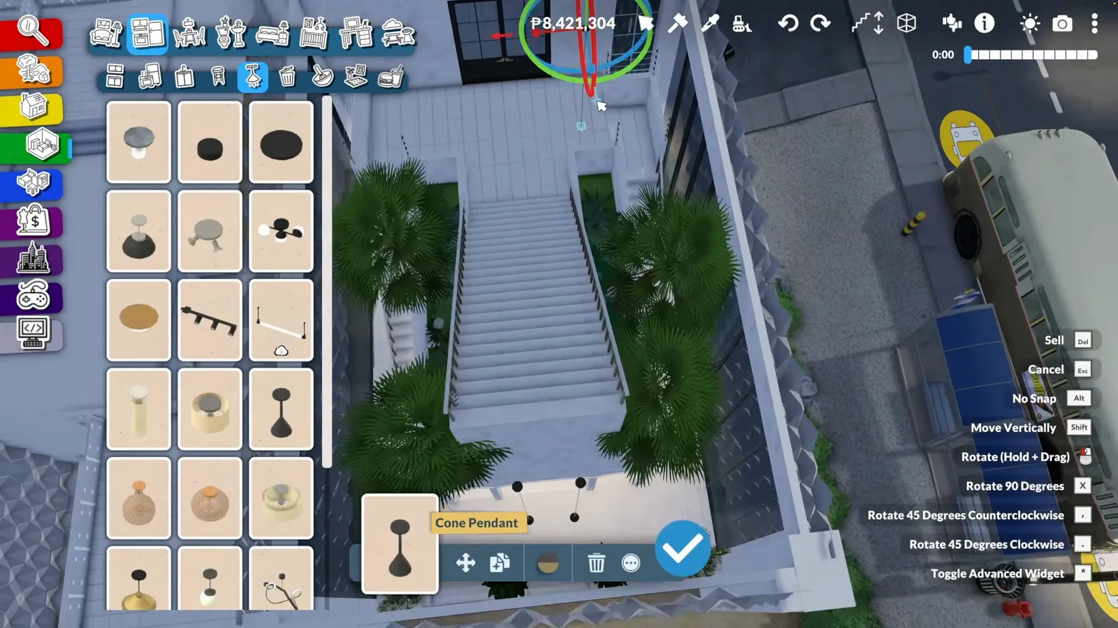 Top-down view of a Paralives hotel atrium with twin white staircases tropical planters and floor-to-ceiling glass onto the sea