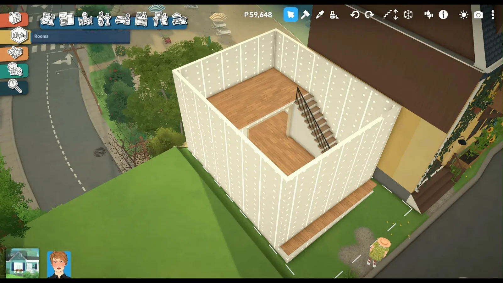 A staircase inside a white Paralives loft shell, seen from above in build mode.