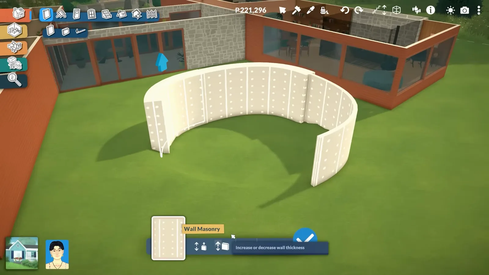 In Paralives, a curved white half-wall rings a sunken back-yard patio as the red-roofed ranch and its glass spine rise behind. In Paralives, a curved white half-wall rings a sunken back-yard patio as the red-roofed ranch and its glass spine rise behind.