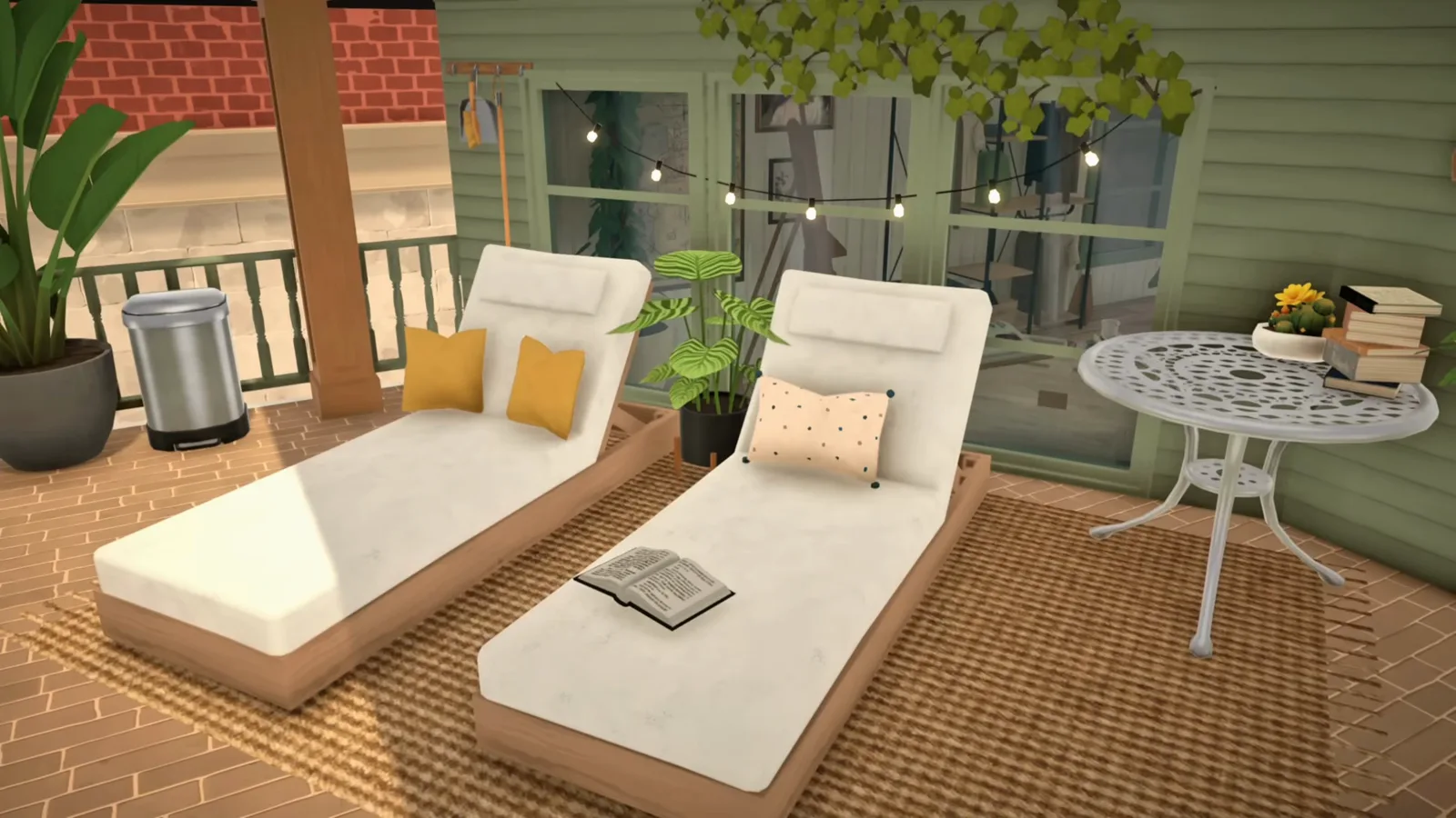 Finished Paralives house renovation with a sunbathing terrace, string lights and loungers overlooking the back garden