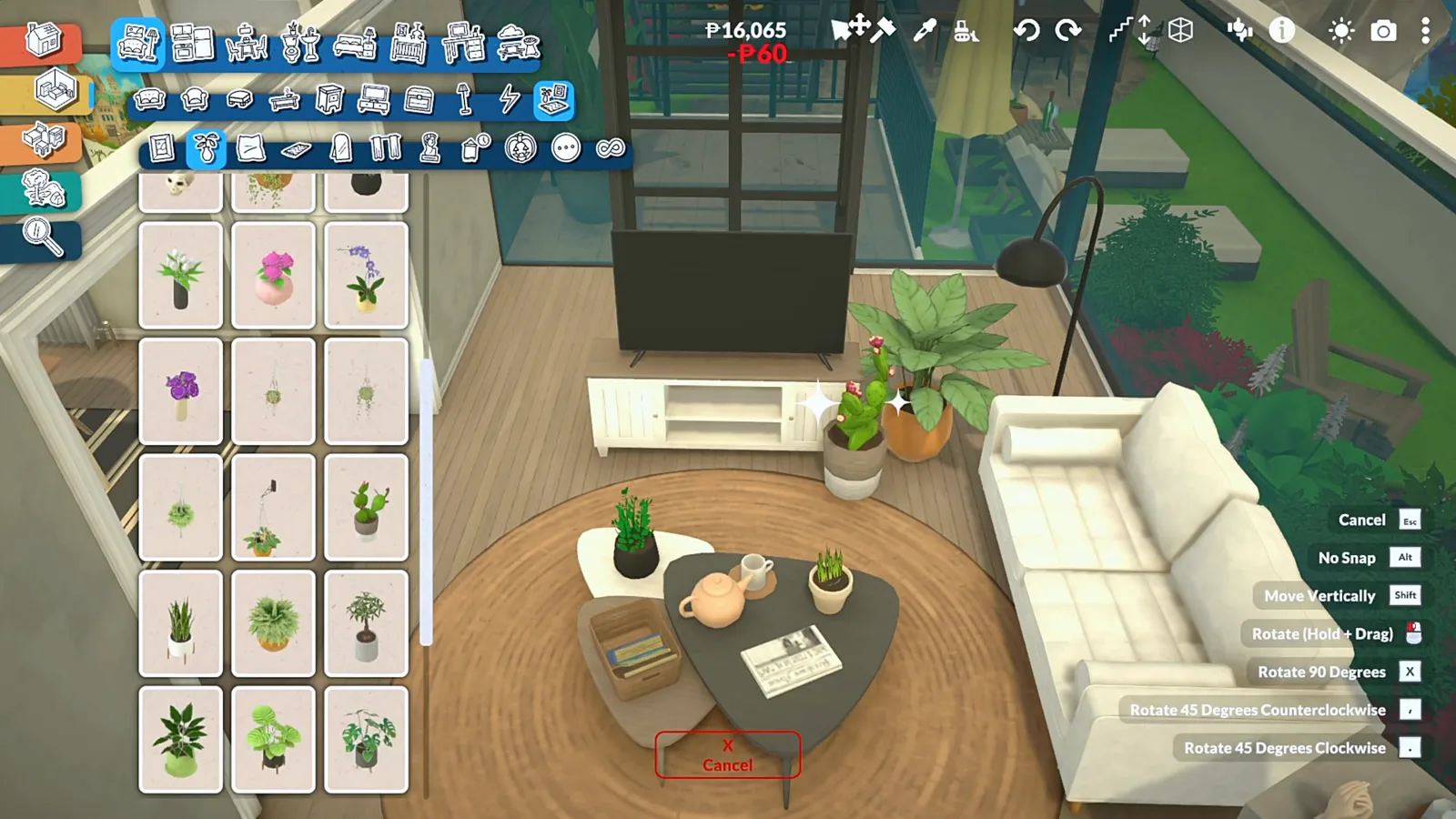 Finished Paralives sunroom lounge with white sofa, teapot on a kidney coffee table and floor-to-ceiling glass opening onto the garden Finished Paralives sunroom lounge with white sofa, teapot on a kidney coffee table and floor-to-ceiling glass opening onto the garden