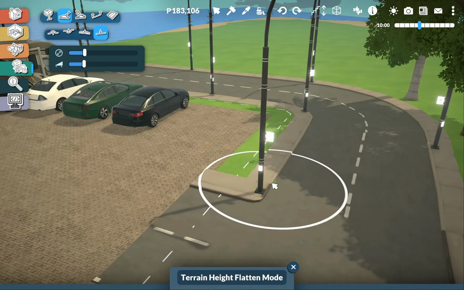 Terrain Height Flatten Mode brush circle evening the ground where a Paralives supermarket parking lot meets a curving coast road