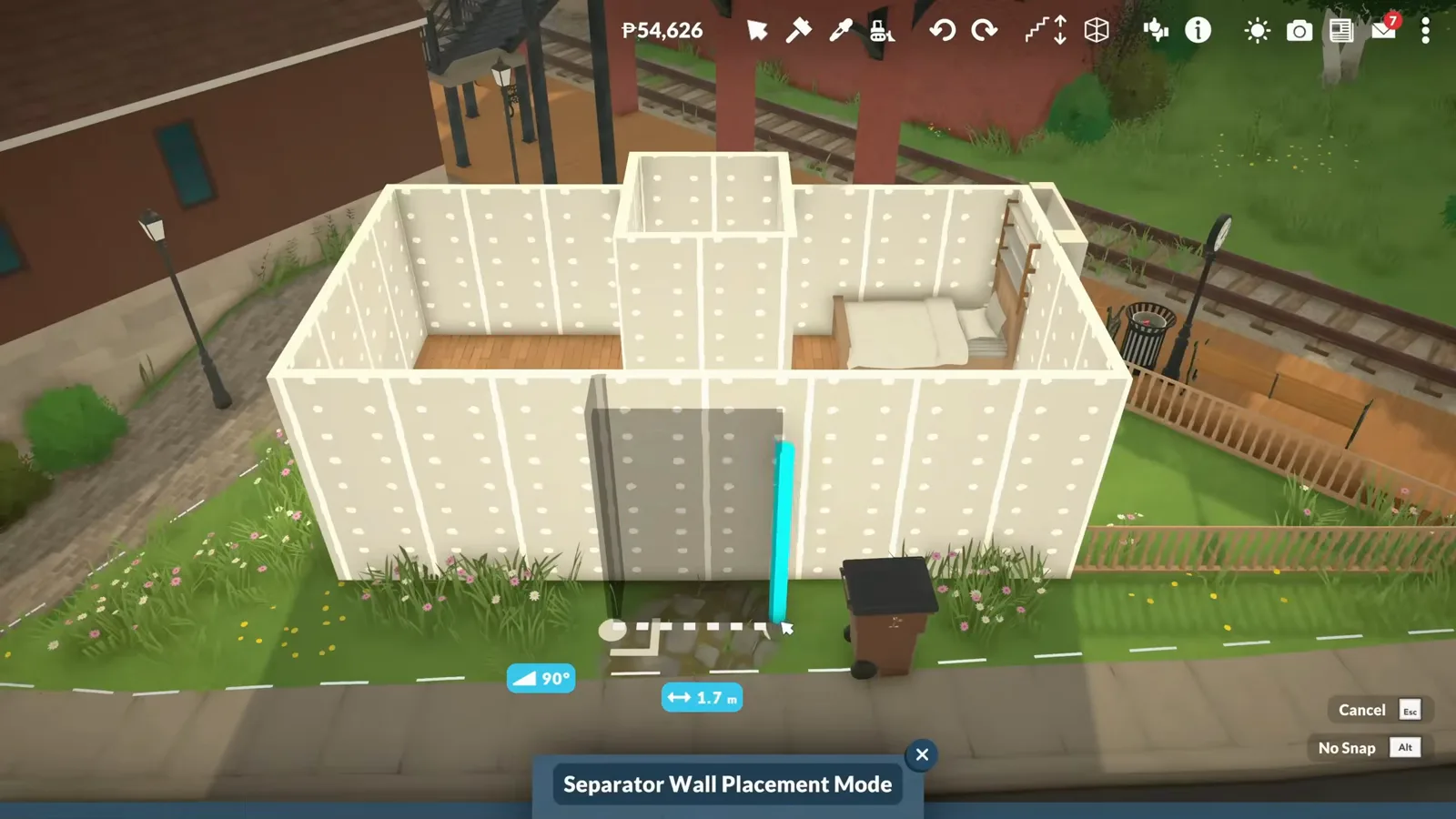 Seen from above, a Paralives micro house shell gets a separator wall placed about a meter and a half from its front wall